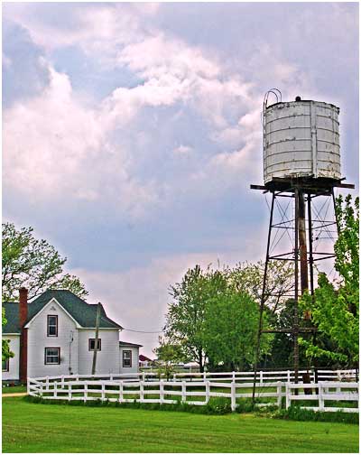 Farmhouse with water tower